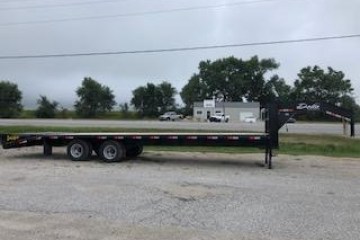 a train is parked on the side of a road